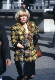 Lady carrying Yorkshire Terrier