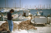 Fisherman and nets on the Quay