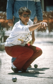 Lady playing petanque