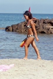 Girl on the beach, black and white bikini
